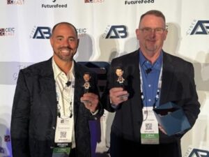 two men with their awards