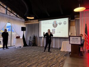 Speaker presenting at Space Coast contracting summit